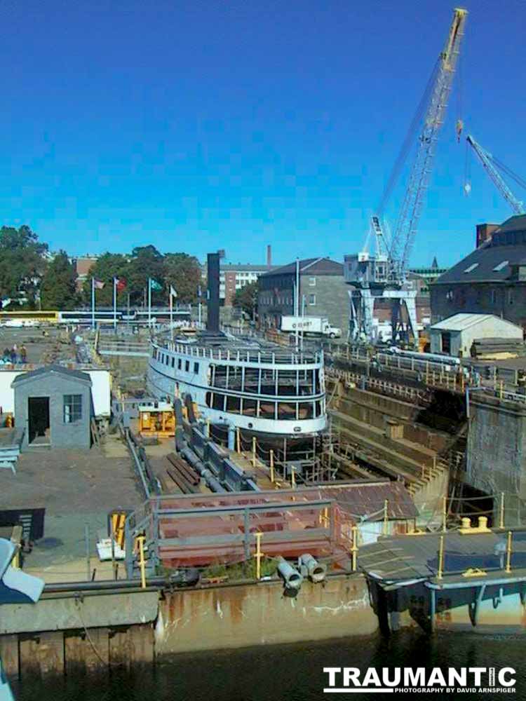A boat under construction in drydock