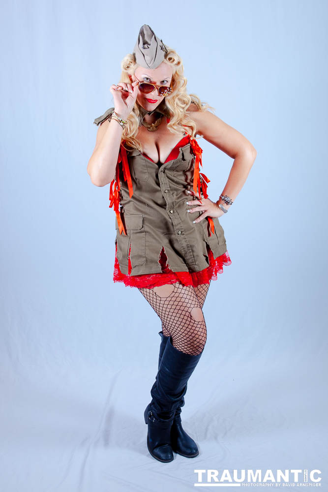 Nuclear Bombshells - Goldie Goldsmith provides the va-va-voom with her pinup girl looks.