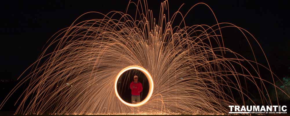 Steel wool ignited, spun  and captured in long exposure.