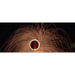 Steel wool ignited, spun  and captured in long exposure.