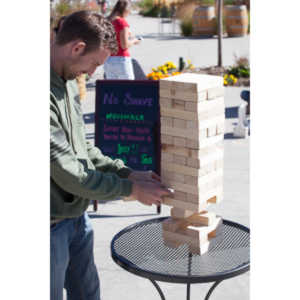 I happened upon this young couple playing Giant Jenga.