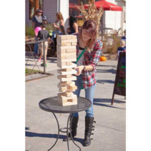 I happened upon this young couple playing Giant Jenga.