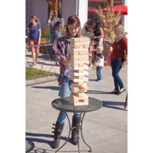 I happened upon this young couple playing Giant Jenga.