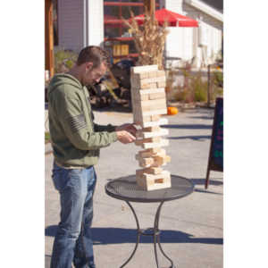 I happened upon this young couple playing Giant Jenga.