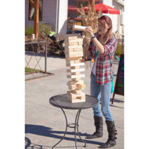 I happened upon this young couple playing Giant Jenga.