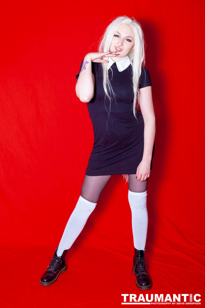 Our second set of shots.  A cute schoolgirl looking black dress and her great look.  A fun series.