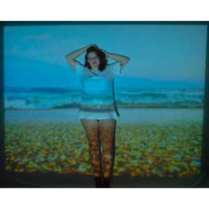 The hanging chair I owned finally got into a photo-shoot with Mary.