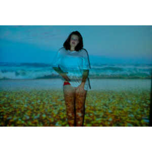 The hanging chair I owned finally got into a photo-shoot with Mary.