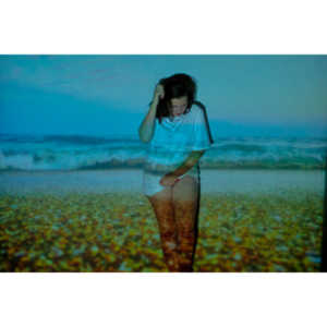 The hanging chair I owned finally got into a photo-shoot with Mary.