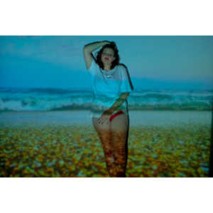 The hanging chair I owned finally got into a photo-shoot with Mary.