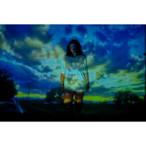 The hanging chair I owned finally got into a photo-shoot with Mary.