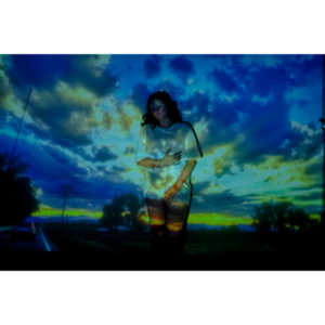 The hanging chair I owned finally got into a photo-shoot with Mary.