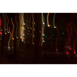 Last Picture Of The Year 2013 - This was actually taken 5 days before the end of the year, but due to circumstances I didn't shoot again after that point.  I was walking along Carson Street in Las Vegas and I saw a reflection I wanted to try to capture.  I ended up with this weird image.  It's junk, but I still liked it.  It's got neat squiggles in it.  Don't judge me!